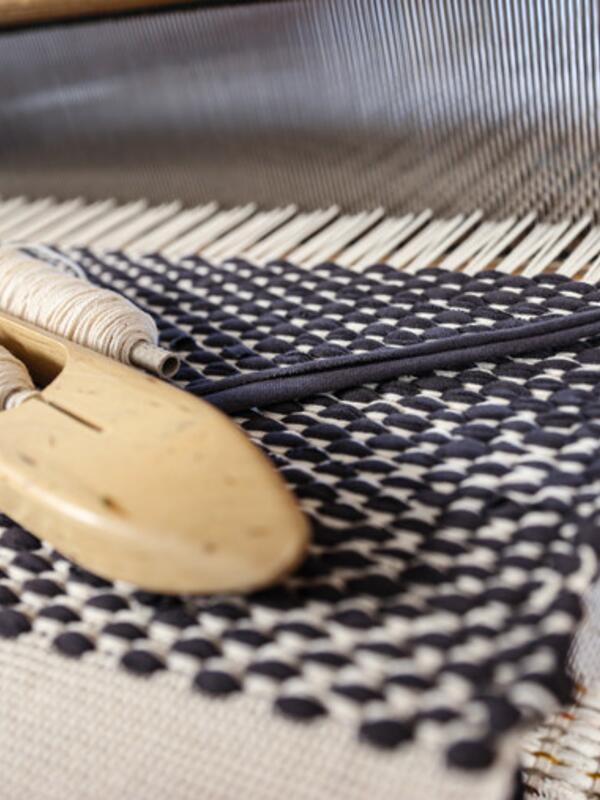 Weberei, Detail auf Webstuhl