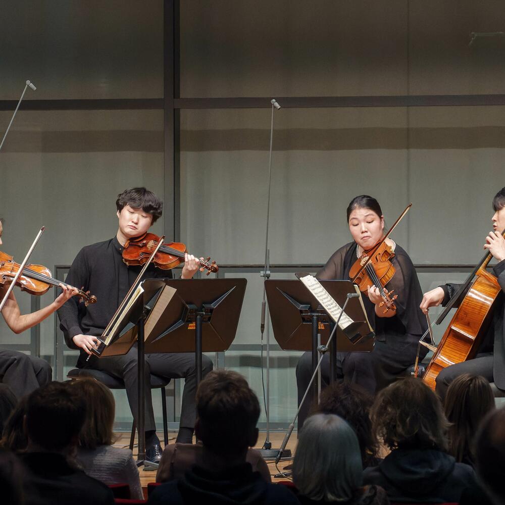 Arete Quartet auf der Bühne | © Michel Klimt
